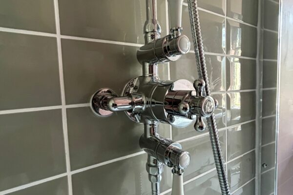 Grey Tiling and Chrome Shower Installed by MW Plumbing